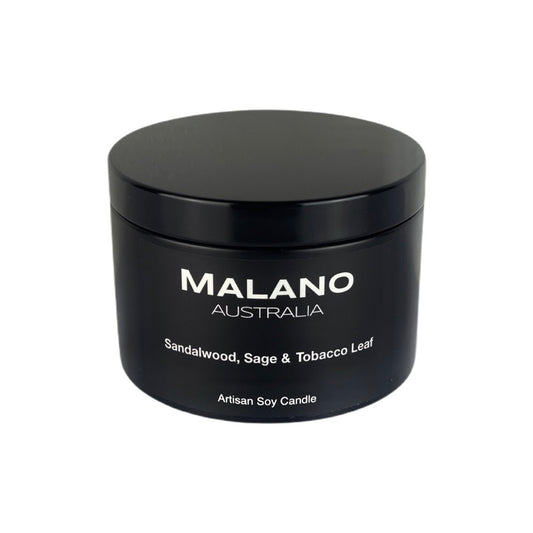 Black matte tin with a lid on,  containing a luxury Australian artisan, hand poured, scented soy wax candle by Malano with a dry woods scent of Sandalwood, Sage and Tobacco Leaf, against a white background.