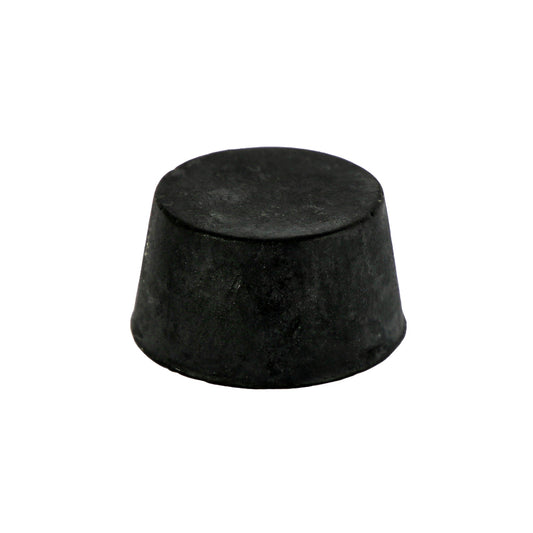 A round black organic block of  Black Kraken Rum Soap Block containing  Activated Charcoal and Kraken Rum against a white background.