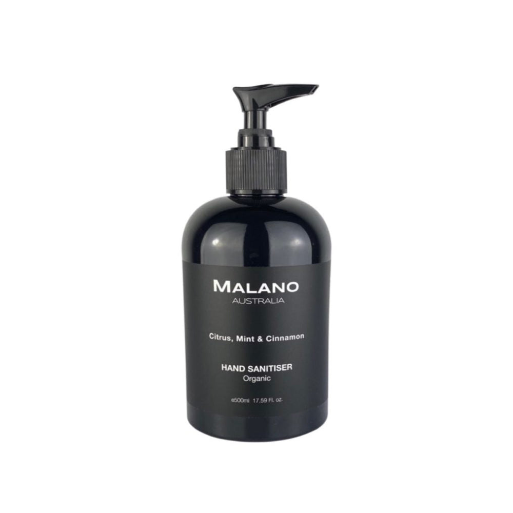 A black pump bottle of organic hand sanitiser labelled 'Malano - Citrus, Mint & Cinnamon Hand Sanitiser Organic' with a capacity of 500mL, and the bottle sitting against a white background