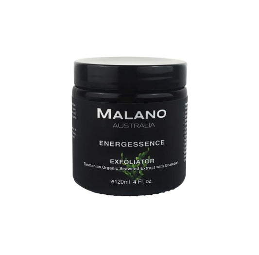 A black jar labeled 'Malano Energessence Exfoliator' Tasmanian Organic Seaweed Extract with Charcoal. The label has a green leafy seaweed design, with a black background and white writing, indicating it is a skincare product.