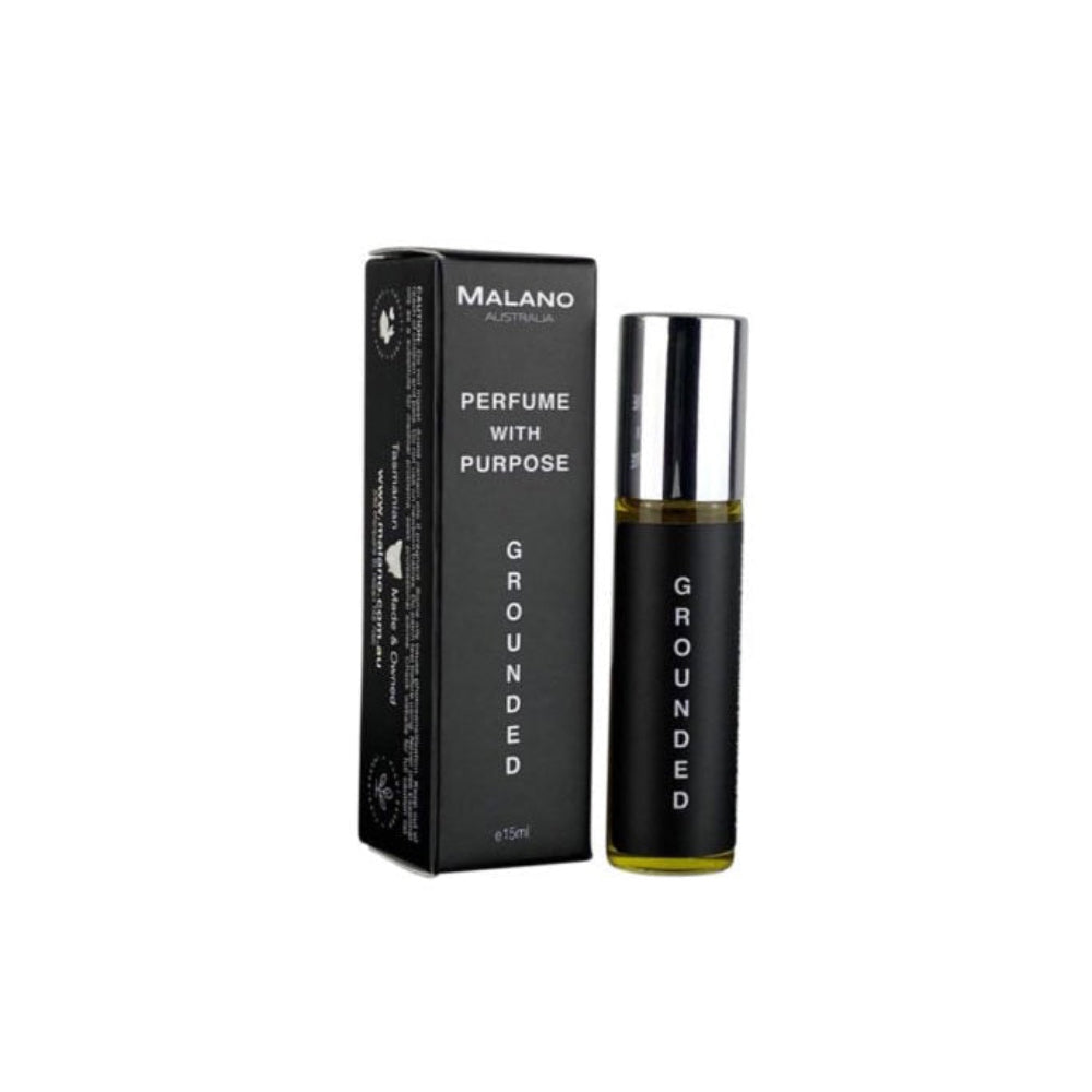 A clear glass roll on perfume bottle and black label and box set with white text, labeled 'Grounded, Perfume With Purpose' and Malano.