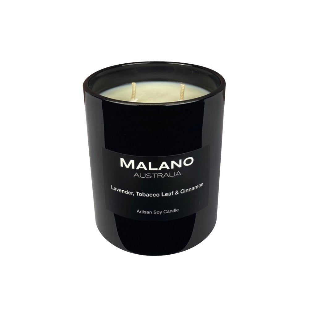 Black gloss glass jar containing a hand poured scented soy candle by Malano Australia, featuring a dry woody, floral scent of Lavender, Tobacco Leaf and Cinnamon. Sitting against a white background
