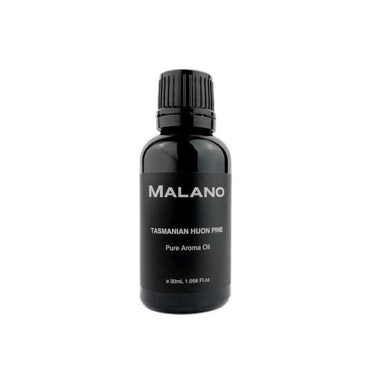 A black bottle with a white label displaying 'MALANO TASMANIAN HUON PINE Pure Aroma Oil' for humidifiers and a measurement indication of '30mL'.