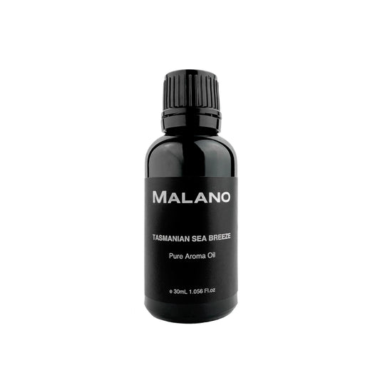 A black bottle with a white label displaying 'MALANO TASMANIAN SEA BREEZE Pure Aroma Oil' on a plain background.