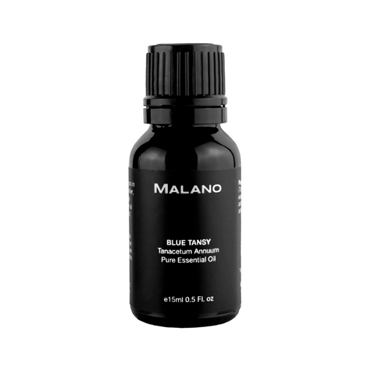 A black bottle of essential oil with Blue Tansy Tanacetum Annuum Oure Essential Oil, the brand Malano and the capacity of 15mL written in white text, the bottle is sitting against a white background.