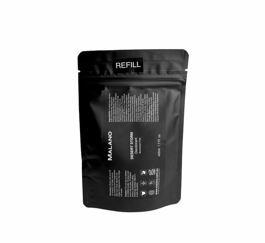 A black refill bag with the brand ‘MALANO’ and the scent reading ‘Desert Storm’,  ‘Aluminium Free’, ‘Deodorant’  and ‘REFILL’ on the front.
