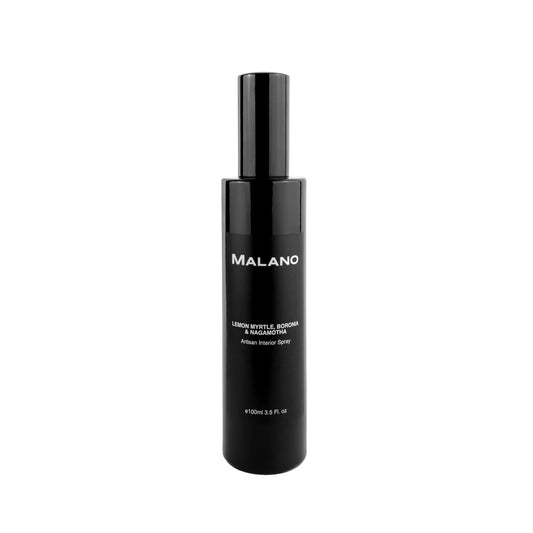 A sleek blackgladd  spray bottle labeled 'MALANO' with text indicating it is a 100mL Lemon Myrtle, Boronia & Nagamotha interior spray.