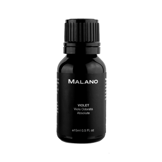 A black bottle of MALANO VIOLET ABSOLUTE essential oil 15mL, with a white label displaying the product name and volume information.