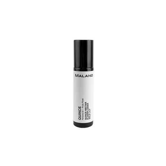 A black roll-on perfume bottle with a white label that reads 'Quince Perfume Oil’' and '10mL'. with the brand being Malano.