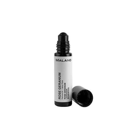 A black roll-on perfume bottle with a white label that reads 'ROSE GERANIUM' ‘10mL’ and the brand 'MALANO'. The cap is removed, showing the perfume roller ball for the oil inside.