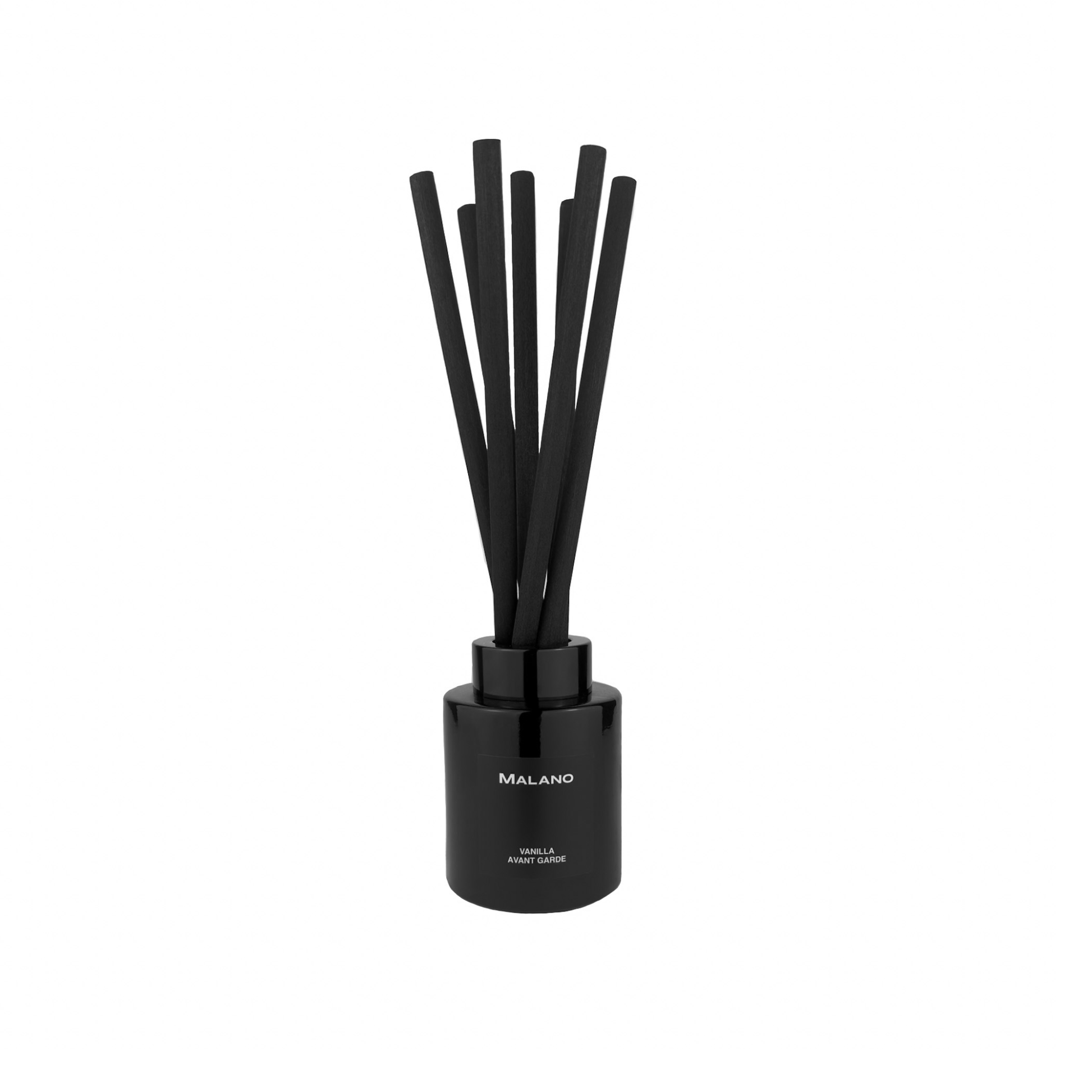 A black reed diffuser with seven long, slender reeds inserted into a cylindrical container with a label that reads ‘Vanilla Avant Garde’ on the front.