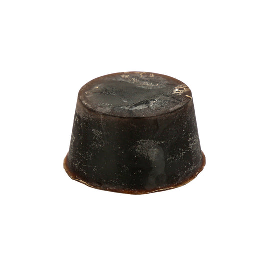 A round and dark brown coloured, 50 Shades of Tasmania scented Organic   Soap Block with Shea Butter and Cupuacu Butter