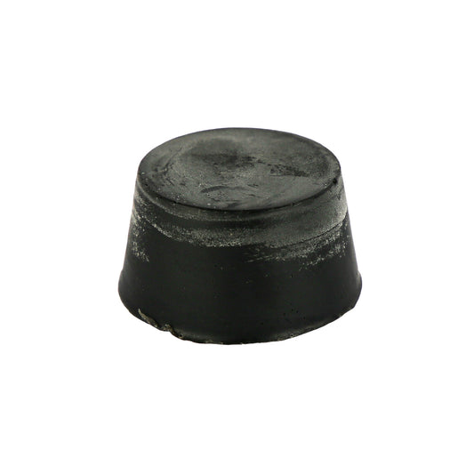 A black round block of Aniseed, Blood Orange and Activated Charcoal soap with a textured surface.