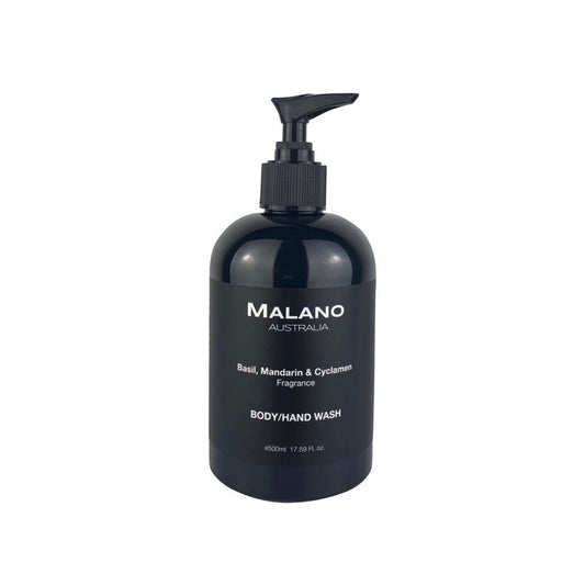 A black pump bottle labeled 'Malano nBody/Hand Wash with the scent of Basil, Mandarin, and Cyclamen sitting against a white background.