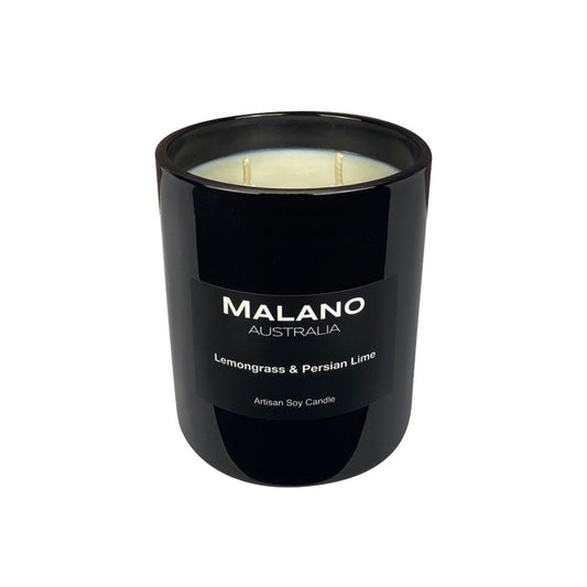 Luxury black glass soy candle by Malano  with two wicks, featuring a rich fragrance blend of Lemongrass and Persian Lime and sitting against a white background. Hand-poured artisan candle for home fragrance and relaxation.