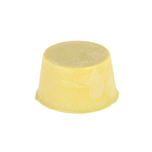 A round and light creamy yellow coloured shampoo bar for light hair, with a smooth surface on a white background.