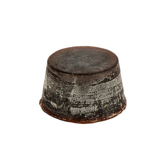 Organic round Summer Fruits Soap Block with Nectarine, Peach, White Grapefruit, Lime, Petitgrain, Musk and Vanilla. Dark brown block sitting against a white backgroud.