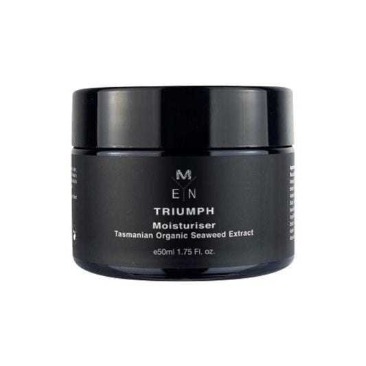 A black jar of Triumph moisturiser with white text detailing the product name and Tasmanian organic seaweed extract and the Malano M monogram on the front with the capacity of 50mL