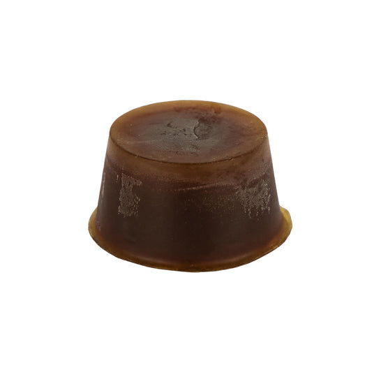 Round dark coloured Organic Wild Lemongrass Soap Block with Shea Butter, Cupuacu Butter, Lemongrass, Lime, Lemon Peel, Rosewood, Cedarwood, Jasmine & Vanilla.